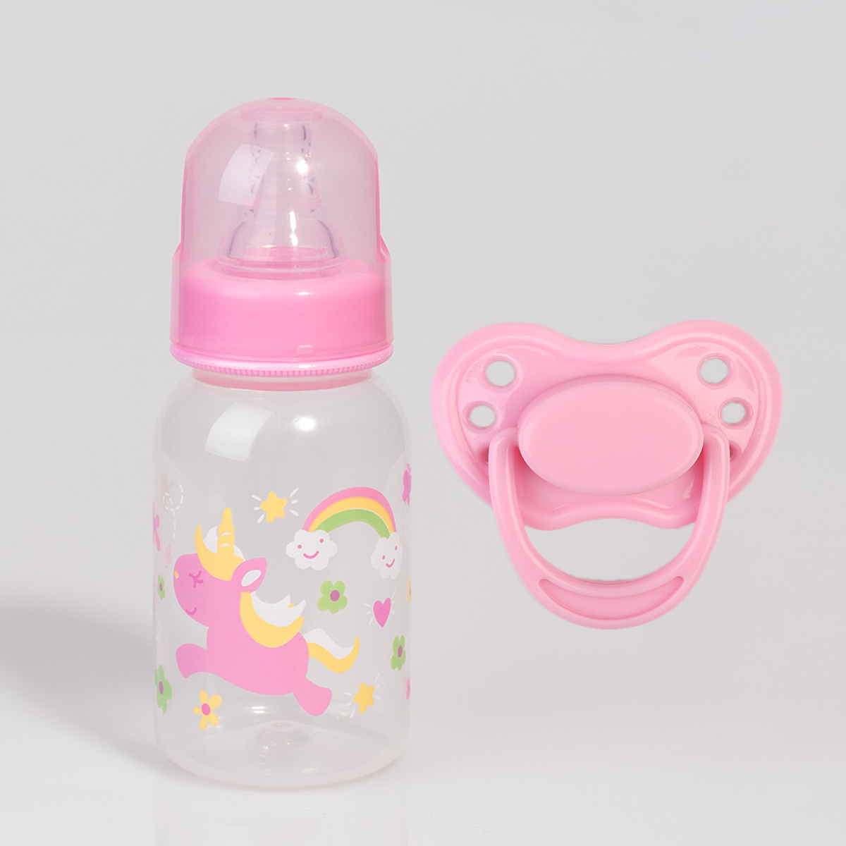 doll with dummy and bottle
